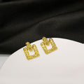Gold Textured Open Geometric Square Stud Earrings Pair view 1