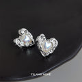 Silver Tone Liquid Ripple Heart White Pearlescent Center Stud Earrings view 4