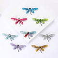 Translucent Dragonfly Brooch with Polished Metal and Decorative Accents view 1