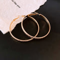 Textured Metal Hoop Earrings in Gold and Silver Two Sizes view 9