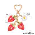 Resin Strawberry Charm Keychain with Enamel Daisy Accent view 2