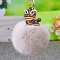 Lion Dance Plush Pom Pom Keychains in Eleven Pictured Colors view 2