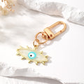 Gold Tone Exploding Evil Eye Clip Keychains in Five Colors view 7