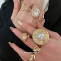 Gold Tone Textured Pearl Open Ring Seven Piece Set view 1