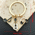 Four Guitar Keyboard and Headphone Metal Keychain Designs view 6