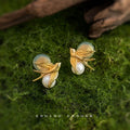 Gold Tone Bird And White Pearl Earrings In Stud And Clip On Styles view 4