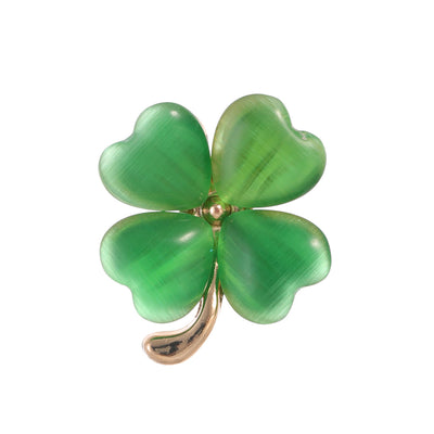 Front product view of an emerald green four leaf clover brooch