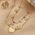 Wing Heart Ring and Crystal Necklace Collection in Gold Tone view 1