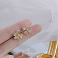 Gold Four Petal Pave Clear CZ Flower Stud Earrings view 3