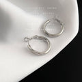Round Huggie Hoop Earrings In Gold Silver Polished And Matte view 8