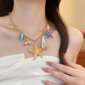 Gold Tone Sea Life Charm Necklace in Two Colorways view 3