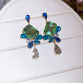 Faceted Crystal Floral Drop Stud Earrings with Polished Metal Tone Details view 6