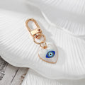 Gold Tone Evil Eye Printed Heart Lobster-Clasp Charms in Six Designs view 4