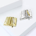 Textured Open Book Brooch with Raised Fountain Pen Detail view 4