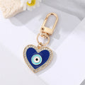 Gold Tone Blue Evil Eye Heart Round and Teardrop Clip Keychains view 9