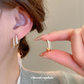 Gold Tone Double Bar Crystal Huggie Earrings for Women view 1