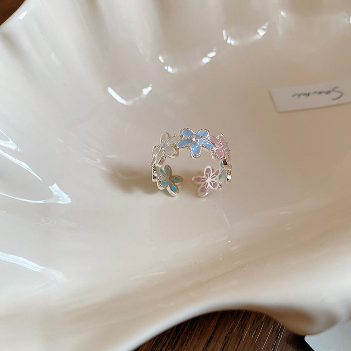 Silver Open Flower and Blue Bow Pearl Accent Rings