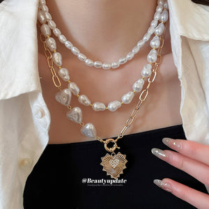 Layered Pearl And Gold Tone Heart Necklace Set With Decorative Accents