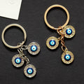 Triple Round Rhinestone Blue Evil Eye Keychains in Two Finishes view 2