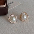 Gold Tone Pearl Stud Earrings with Crystal Round Frames view 6