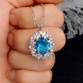 Silver Tone Ocean Blue Oval Halo Crystal Pendant Necklace view 2