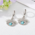 Gold and Silver Tone Crystal Lash Evil Eye Huggie Earrings view 5