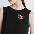 Black Wing Bat Brooch with Gold Tone Body and Red Eyes view 2