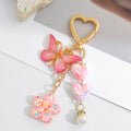 Pink Heart Clasp Keychain with Iridescent Hearts and Glitter Flower Charm view 4