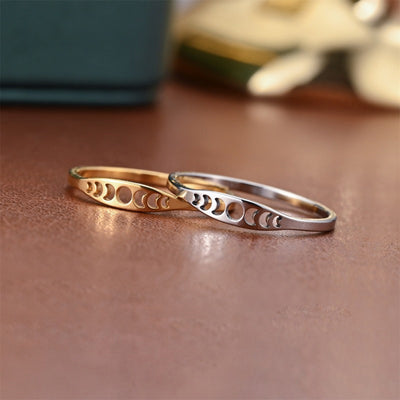 Gold and silver moon phase cutout bands side by side