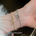 Snowflake Cross And Pearl Like Crystal Bracelets In Gold Or Silver view 1
