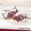 Black and Pink Crystal Leaf Huggie Earrings in Gold Tone view 4