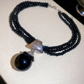 Black Multi Strand Beaded Necklace with Round Pendant view 6