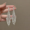 Layered Crystal Chandelier Earrings With Polished Metal Tone Details view 1