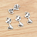 Sitting Cat Metal Charms with Cutout Details in Two Finishes view 2