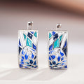 White Gold Tone Blue White Enamel Floral Huggie Hoop Earrings view 5