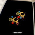 Pair of Metal Tone Multicolor Beaded Mini Hoop Earrings view 3