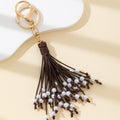 Brown Leather Cord Tassel Keychain With Faux Pearl Beads view 4