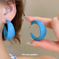 Glossy Blue Acrylic C Hoop Earrings With Decorative Metal Accents view 3