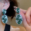 Pair of Metal Tone Purple and Green Crystal Oval Drop Earrings view 3