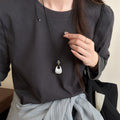 Black Cord Necklace with Silver Tone Sculptural Pendant view 4