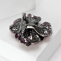Crystal Camellia Brooch In Purple Or Green With Polished Metal Detail view 3