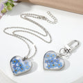Silver Tone Heart Pressed Blue Flower Resin Keychain and Necklace view 1