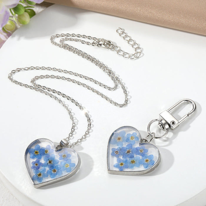 Silver Tone Heart Pressed Blue Flower Resin Keychain and Necklace