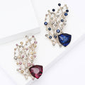 Open Lattice Branch Brooch With Blue or Purple Shield Stone view 1