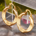 Wide Irregular Hoop Earrings in Gold-Tone Metal Jewelry view 2