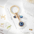 Gold Tone Blue Evil Eye Charm Keychains in Eight Designs view 9