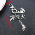 Three Silver Tone Bow Shell and Starfish Clasp Keychains view 7
