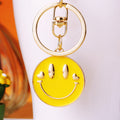Double Sided Smiley Face Keychains in Yellow and White with Braided Loops view 3