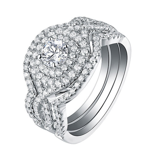 Second product view showing round halo three-ring set