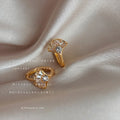 Gold Tone Crystal Fan Huggie Earrings Baguette Leaf Design view 1